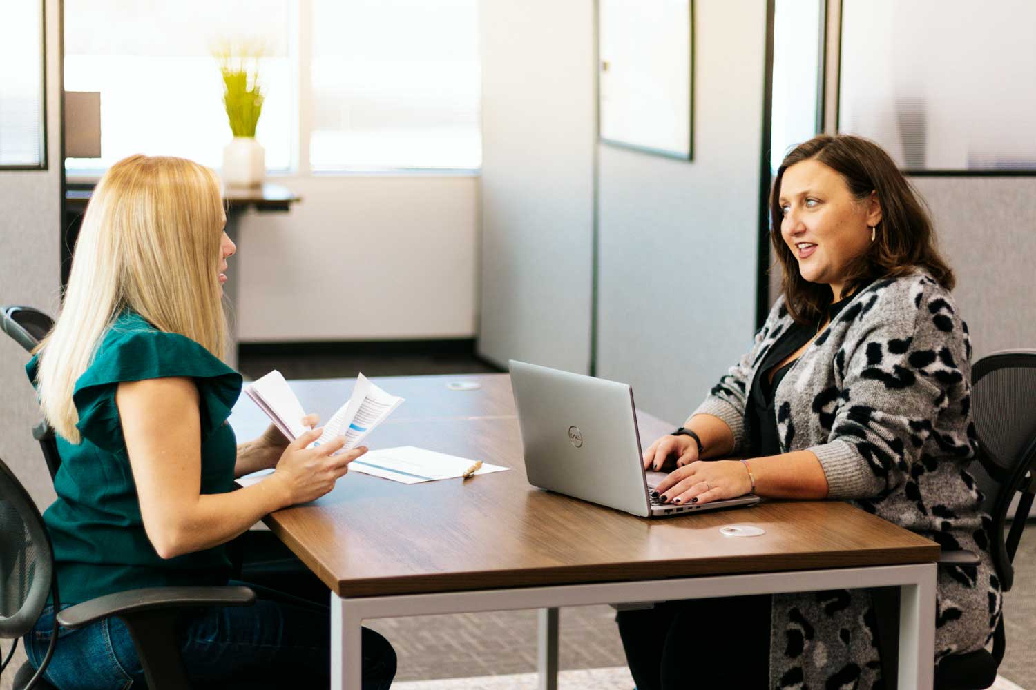 Employees meeting at table