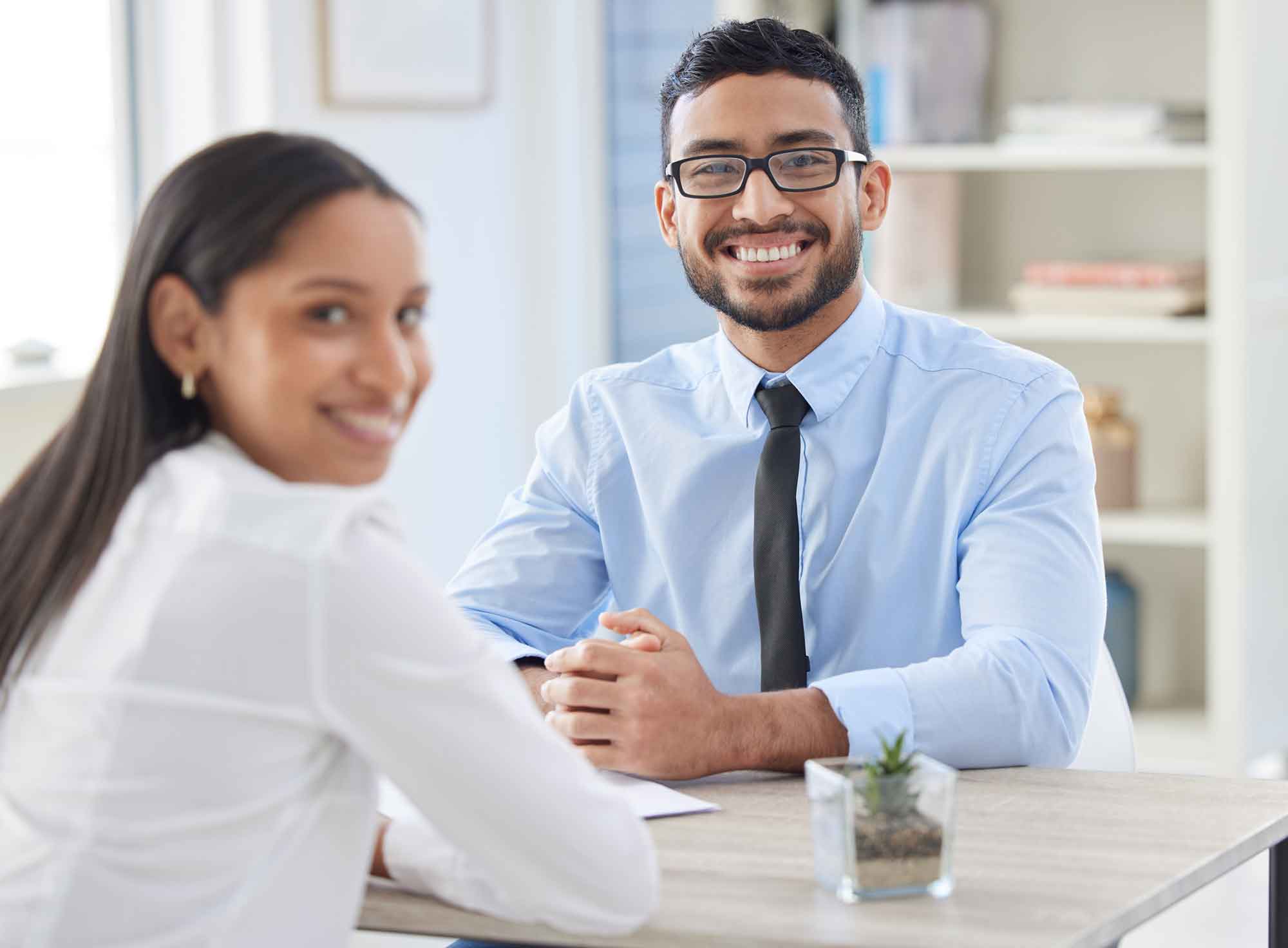 PeopleSmilingDuringInterview Contingent Recruiter in Interview